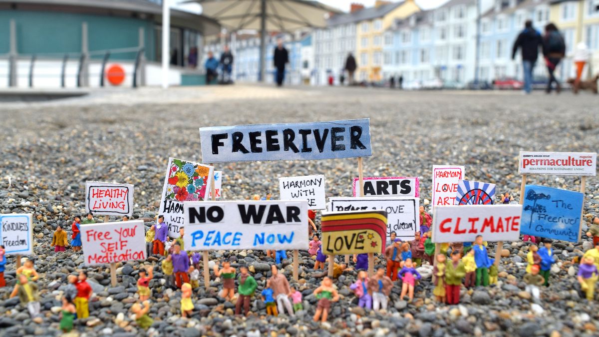 Miniature figurines protesting in Aberystwyth